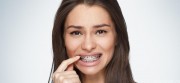 Шатание зубов в брекетах